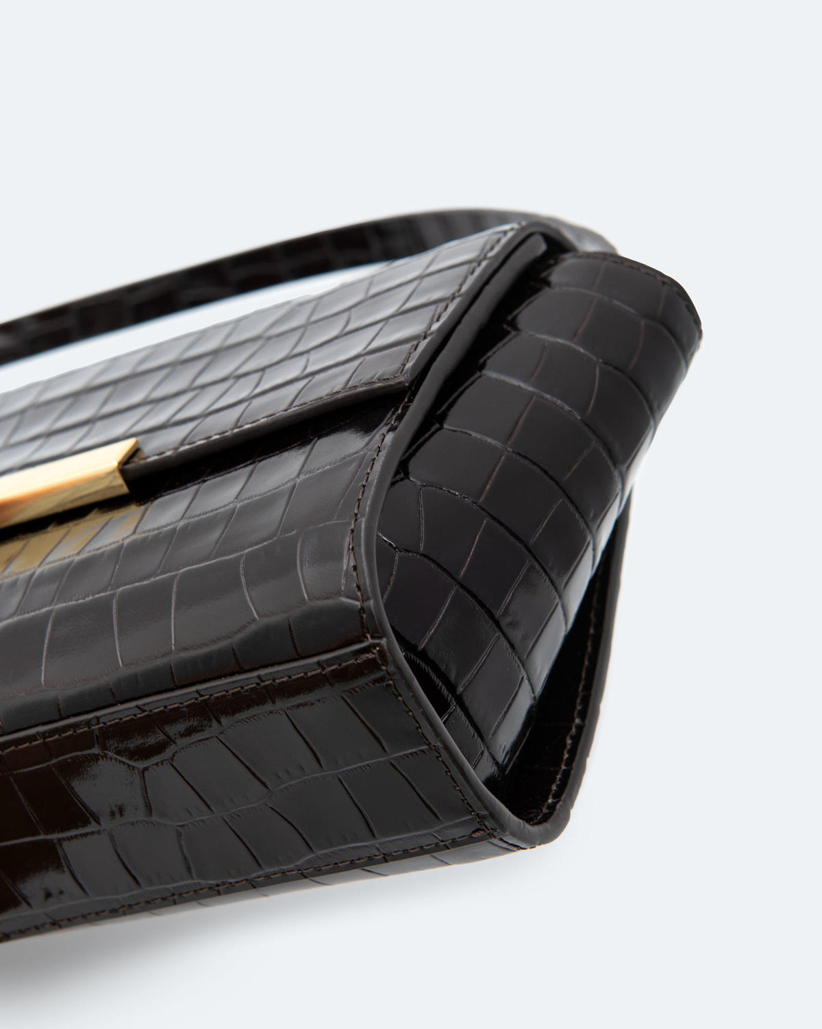 CLUTCH BAG IN PELLE EFFETTO COCCODRILLO