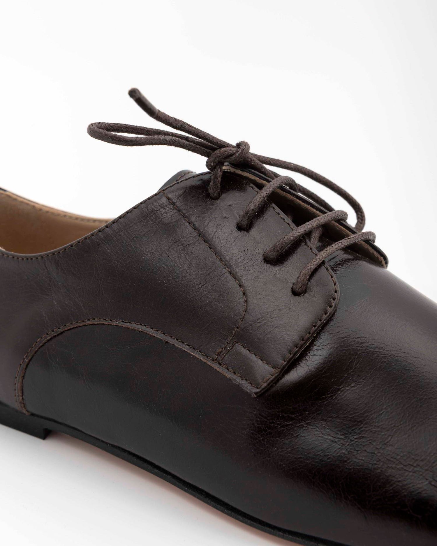 STRINGATA IN PELLE