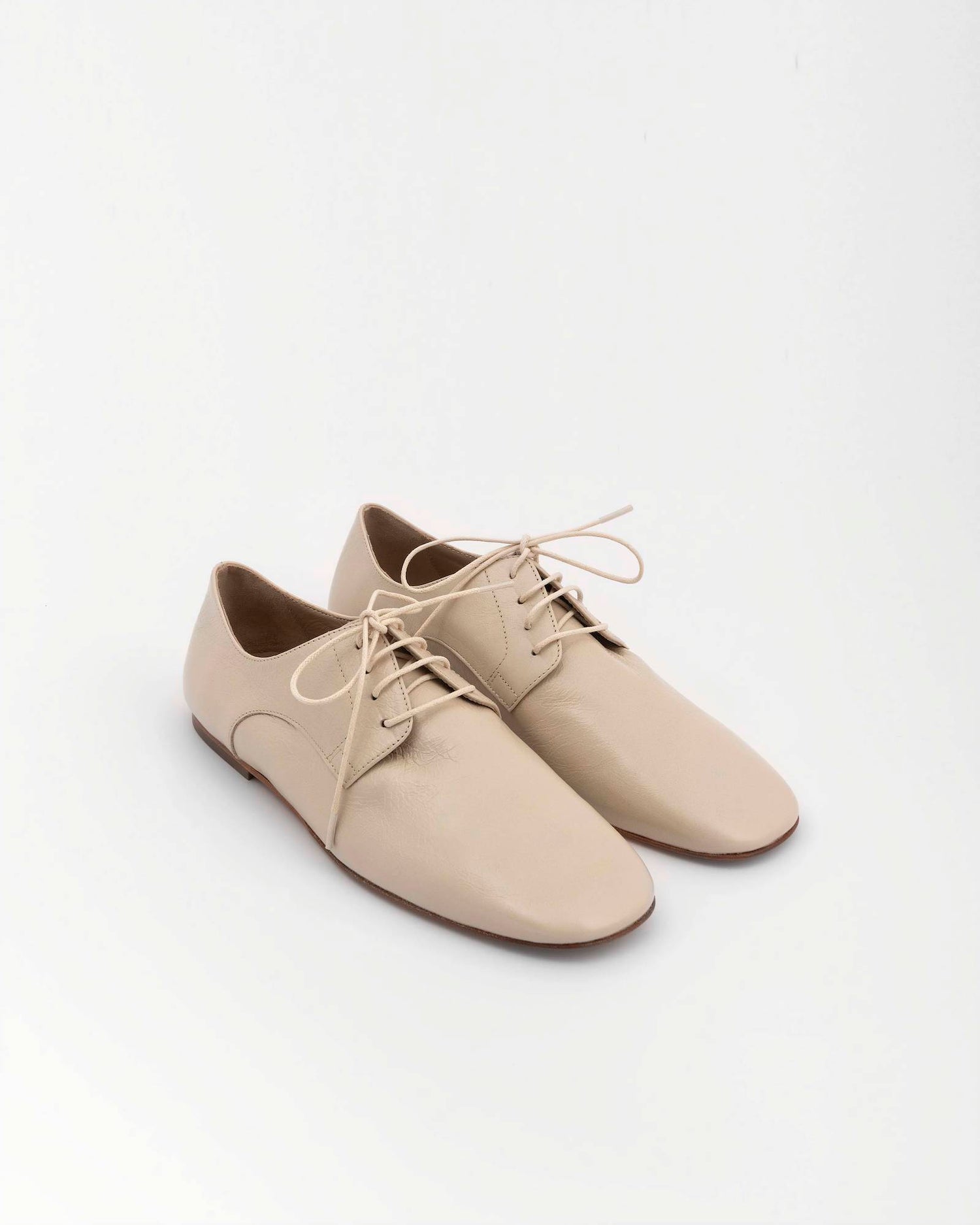 STRINGATA IN PELLE
